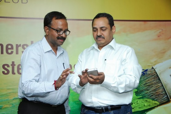 Mr. Balasubramanian, CEO, Birla Sunlife Mutual Fund examining the Wealth Manager App